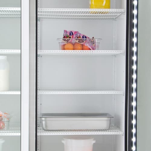 True GDM-49-HC~TSL01 54 1/8" GDM Series Two Section Glass Door Merchandiser - (2) Left/Right Hinge Doors, 115v, White